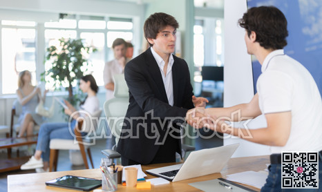 Bank manager talking with male client in office
