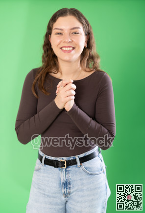 Young woman happy and smiling in front of green screen