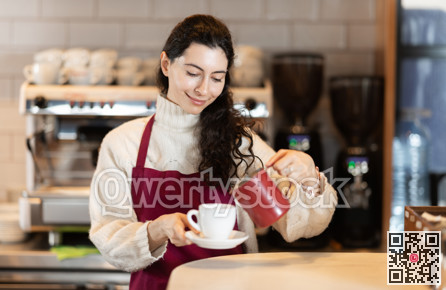 Barista in red apron brewing coffee