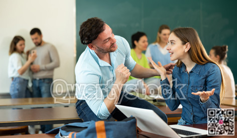 Man and woman students having small talk in classroom