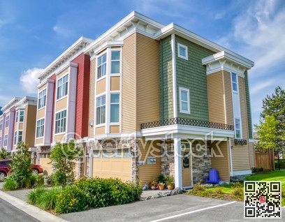 Brand new townhouses neighbourhood on a summer day