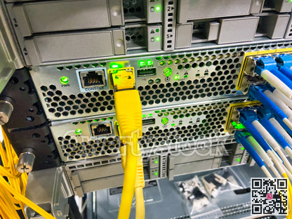 Network equipment with green lights working in a data center