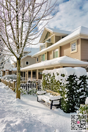 Street of residential duplex houses on sunny winter day in Canada