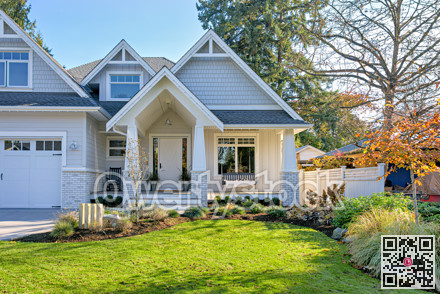 Residential house with open patio at the entrance doors under the porch
