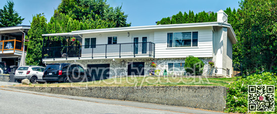 Average family house on land terrace wiith blue sky background