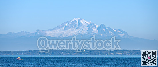 Beautiful view of mountain Baker from the Tsawwassen bech in the evening time