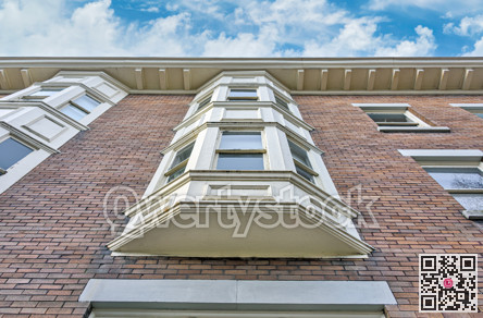 Brick wall of heritage residential building in Vancouver