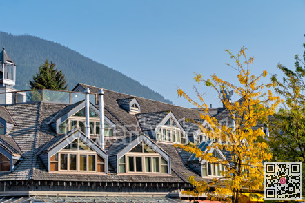 Attic residential units windows on autumn season in Whistler