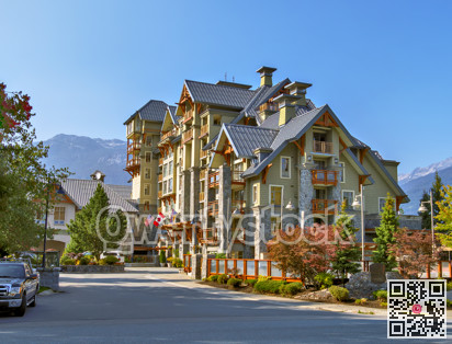 One of a resort residential building on mountain and blue sky background.