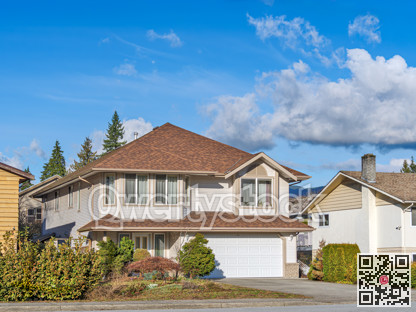Big residential house on bright winter day in British Columbia