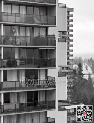 High rise buildings on foggy winter morning in a city