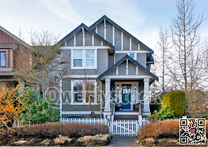 Average residential house decorated with Christmas lights on winter season