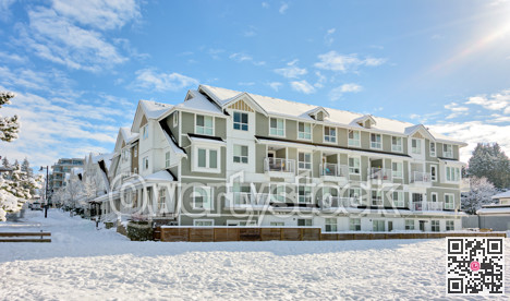 Residential low-rise building on bright winter day in British Columbia