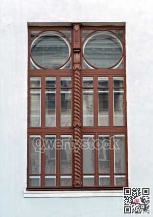 Restored original window of historic building in downtown of Krasnoyarsk city