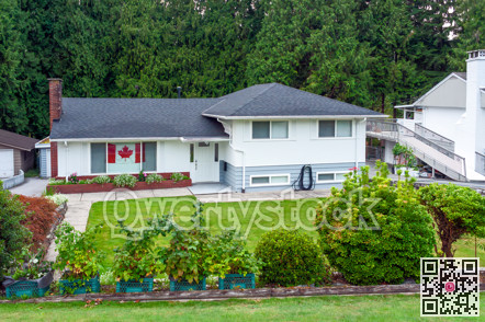 A perfect neighbourhood. Family residential house with canadian flag