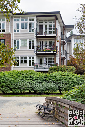 Pathway around the corner of residential building in Fort Langley, BC